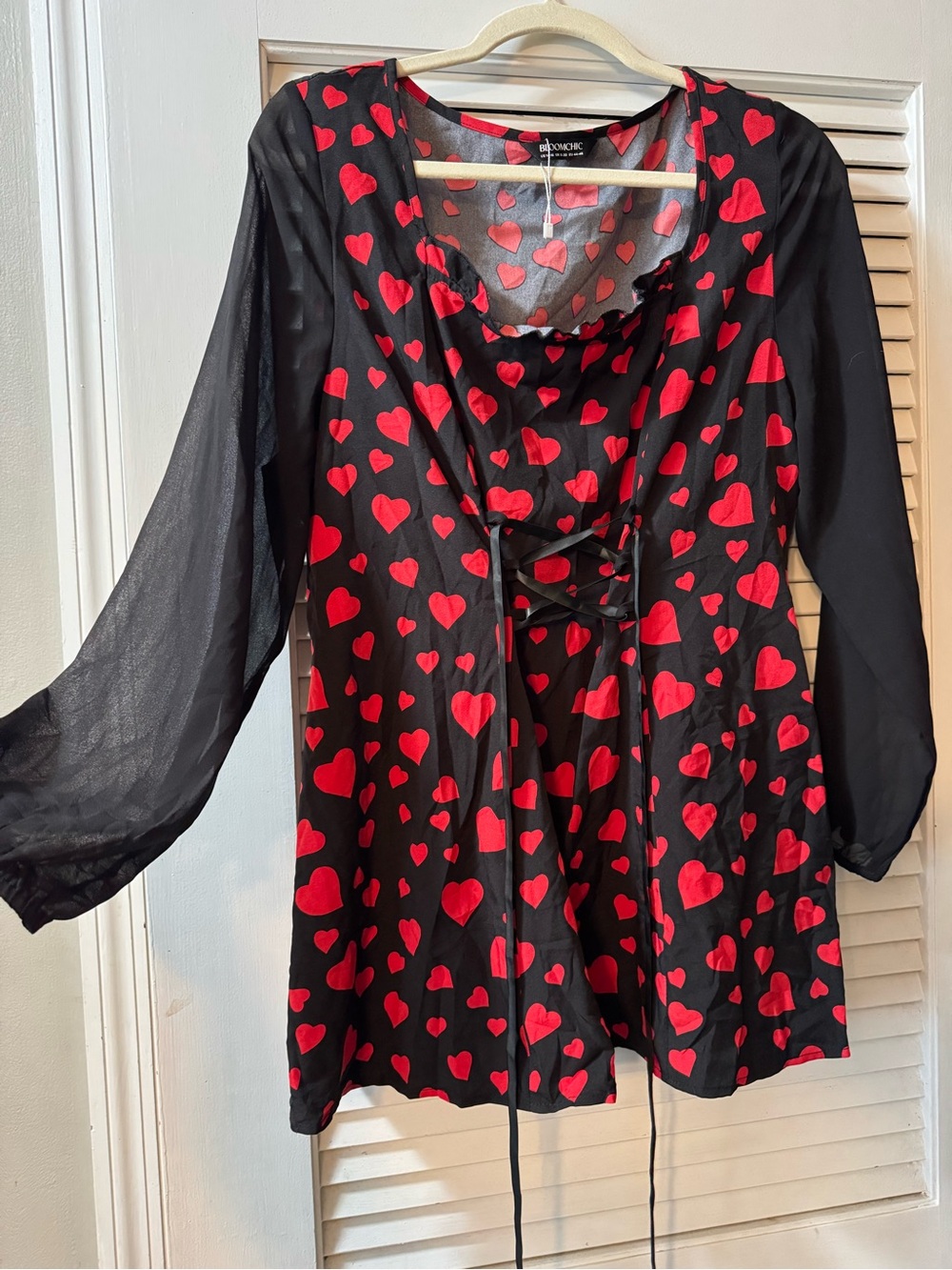 BloomChic Black Top with Red Heart Print